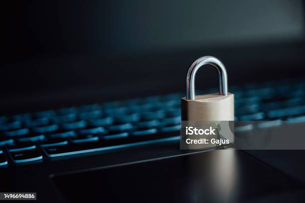 Padlock In Computer A Golden Padlock Placed On Laptop Computer Keyboard Stock Photo ...