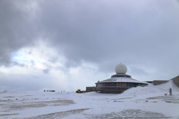 A Scenic view of a ski resort in the Scottish mountain during winter with snow