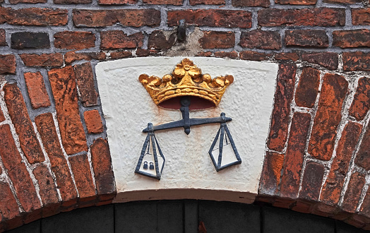 Gable stone in an old weighing house from the 18th century.