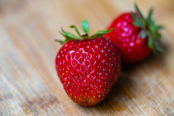 red Fresh ripe Strawberries on wooden table