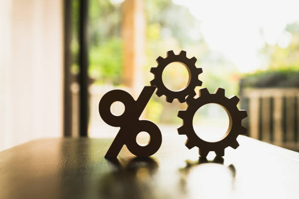 istock Percentage model and gear model with evening sky Key concepts for success, methods, systems of raising or lowering Fed interest rates to correct inflation concepts. 1496708557