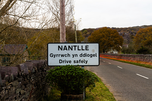 Road sign on entry to to Nantlle a slate quarry village, Gwynedd, North, Wales, UK, landscape