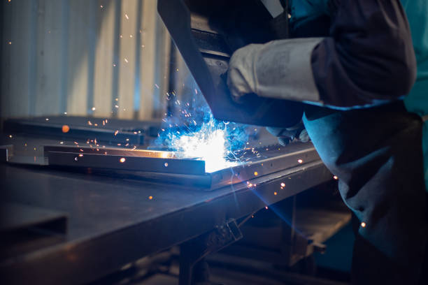 istock Blue Collar Workers- metal welder stock photo 1496713367