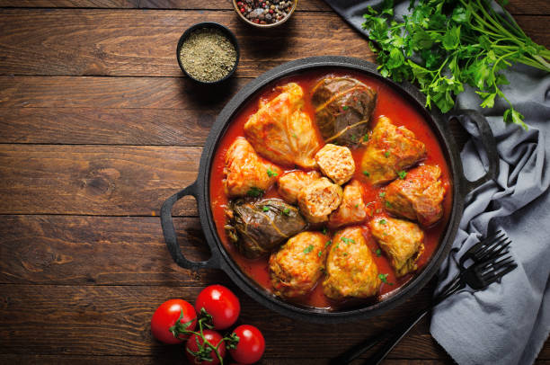 istock Cabbage Rolls with Ground Meat, Rice and Vegetables also known as Sarma, Golubtsy, Dolma on Rustic Wooden Background 1496714539