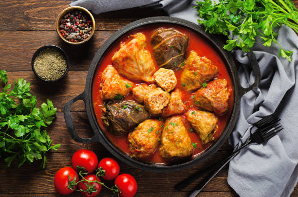 istock Cabbage Rolls with Ground Meat, Rice and Vegetables also known as Sarma, Golubtsy, Dolma on Rustic Wooden Background 1496714647