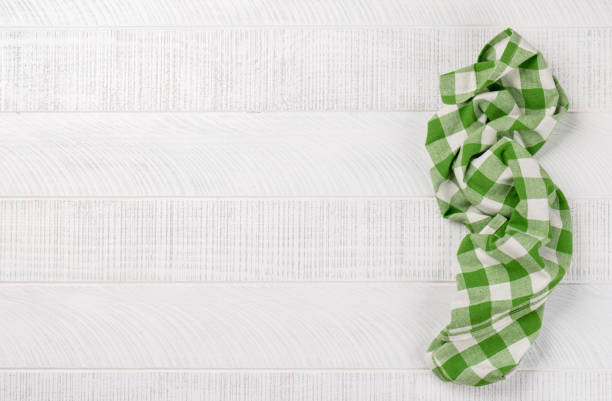 istock Top-down view of a kitchen table with a towel or napkin 1496715036