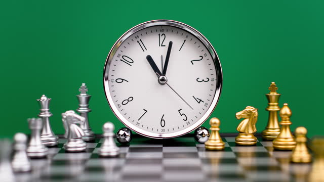 clock speed dial and chess board Strategy planning and strategic concept. Time lapse time. Time concept and value of valuable time.