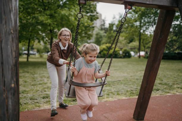 istock Girl loves swinging 1496719798