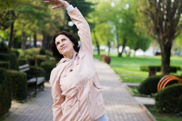istock Woman exercising outdoors 1496723030
