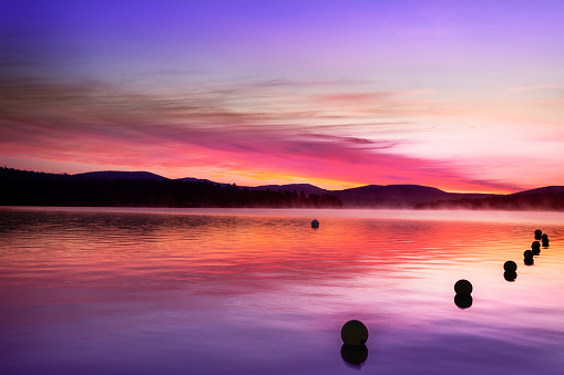 Colors are most vivid before the sun comes over the hills, Merrymeeting Lake, New Hampshire