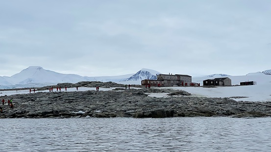 Stonington Island in Marguerite Bay is the site of two early research stations. East Base, the oldest American Antarctic station, and the British Base, Station E.