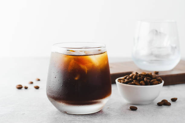 istock Iced Coffee, Cold Brew Coffee with Ice on Bright Background, Coffee Cocktail, Refreshing Beverage 1496731507