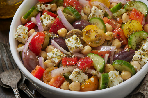 Greek Salad with Feta, Cherry Tomatoes, Cucumber, Olives, Red Onion, Chick Peas and Red Peppers