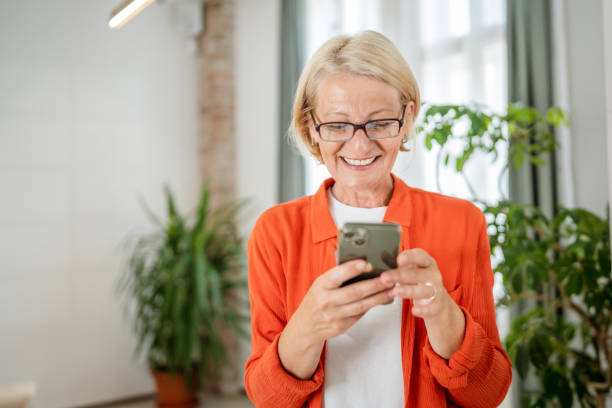 istock Woman with use mobile phone smartphone send sms 1496731728
