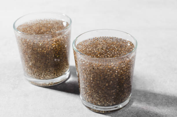 istock Water with Chia Seeds, Healthy Drink on Bright Background 1496735720