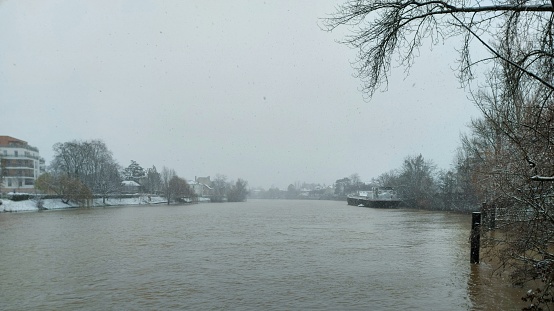 walk along the river by a snowy day