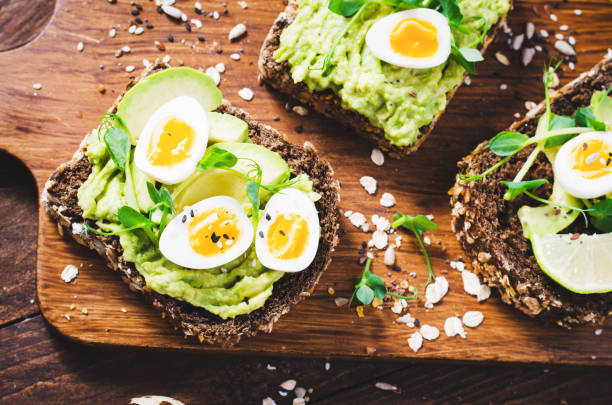 istock Avocado and Quail Egg Toasts, Healthy Snack or Breakfast 1496738173