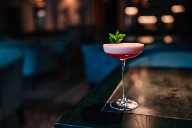 istock alcoholic cocktail in a glass stands on a table in a bar or restaurant 1496738517