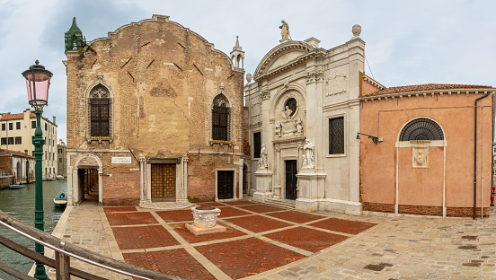 Panoramic exposure of the Square of Campo de L'Abbazia in Venice during day time, located off the beaten path in the northern area of the district of Cannaregio.