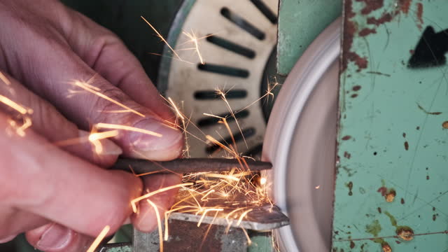 Metal Grinding on an Electric Grinding Wheel
