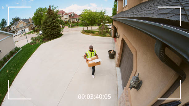 istock Home Security Camera Footage of Package Delivery 1496748220