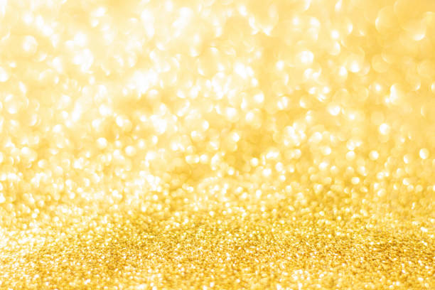 istock Gold glitter defocused texture background. gold christmas abstract background 1496749337