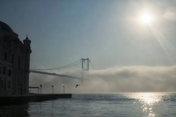 Foggy and Misty scene of Bosphorus Bridge. Bridge over the Bosphorus in Istanbul. View from the Asian part of Istanbul.