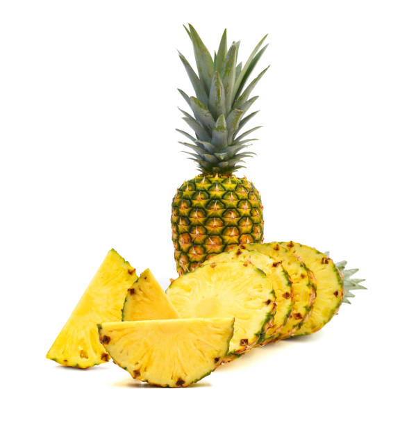istock Fresh whole and slice pineapple. Isolated on a white background. 1496753107