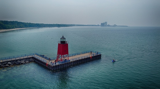 Ariel view of the lighthouse and pier in Charlevoix, MI.