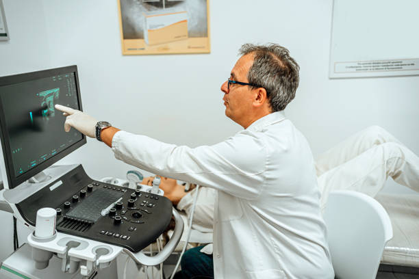 istock Woman having a thyroid ultrasound test 1496754969