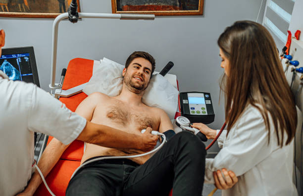 istock Man having an ultrasound examination 1496755758