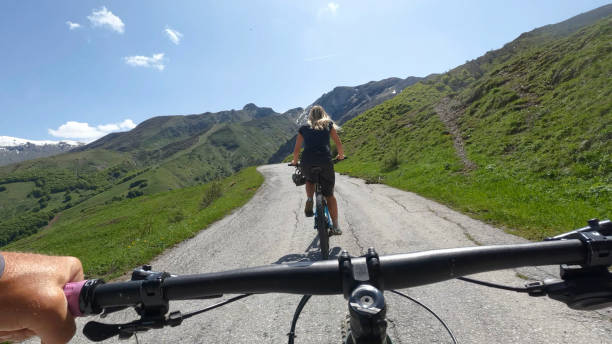 istock First person perspective on biking up mountain road 1496756430