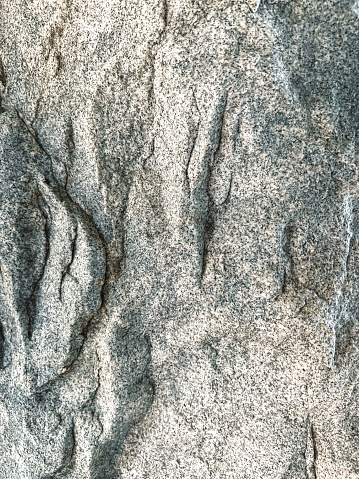 Rough surface Granite Texture Background, as part of an architectural column.