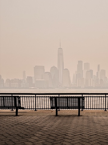 photograph taken from Jersey City of the New York City skyline, clouded with the smog and smoke from the Canadian wildfires