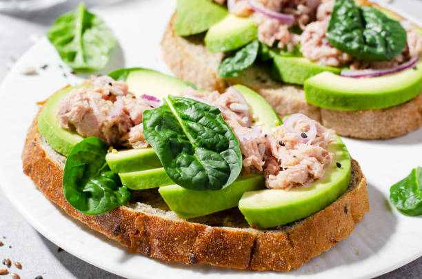istock Tuna Avocado Toasts, Healthy Snack or Breakfast on Bright Background 1496760456