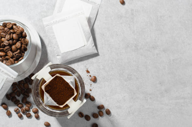 istock Drip Coffee Bag in a Cup, Coffee Trend, Quick Way to Brew Ground Coffee 1496761924