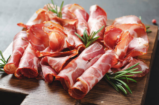 istock Cured Meat Platter, Coppa with Spices, Italian Antipasto, Appetizer over Dark Background 1496763036