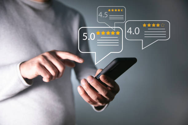 istock User give rating to service excellent experience on mobile phone application 1496763199