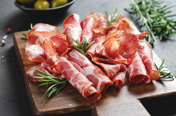 istock Cured Meat Platter, Coppa with Spices, Italian Antipasto, Appetizer over Dark Background 1496763218