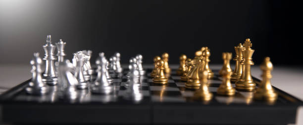 istock chess on the wooden table.concept winner 1496763262
