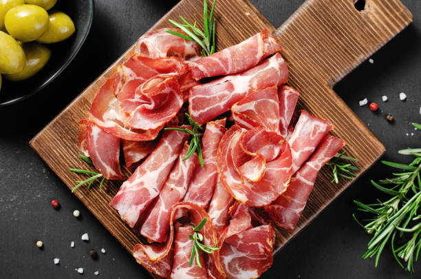 istock Cured Meat Platter, Coppa with Spices, Italian Antipasto, Appetizer over Dark Background 1496763443