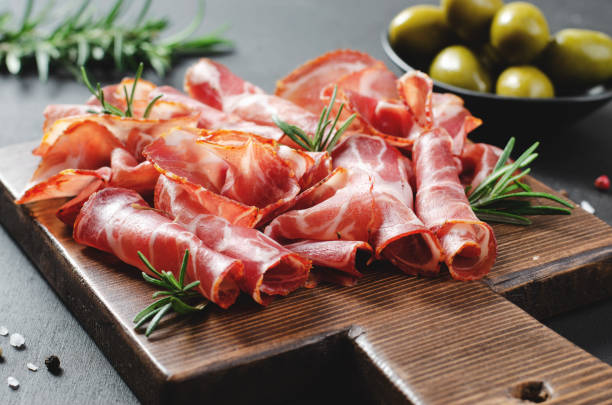 istock Cured Meat Platter, Coppa with Spices, Italian Antipasto, Appetizer over Dark Background 1496764267