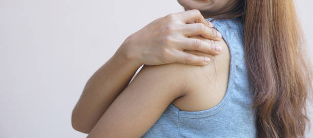 istock Asian woman having shoulder pain 1496769046