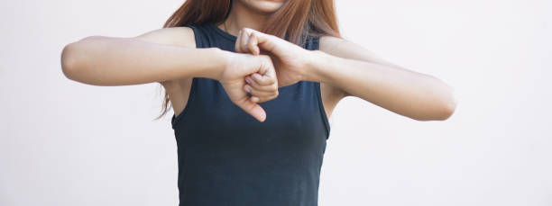 istock Asian woman having itchy skin on hand 1496774905