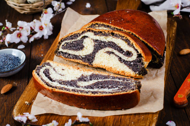 istock Poppy Seed Cake, Traditional Cake on Wooden Easter Table 1496780779