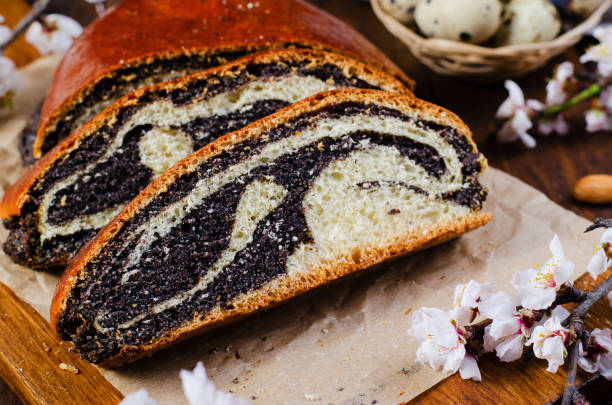 istock Poppy Seed Cake, Traditional Cake on Wooden Easter Table 1496781948
