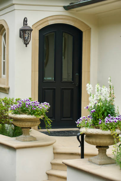 istock Formal Italian villa front porch with potted plants 1496781976