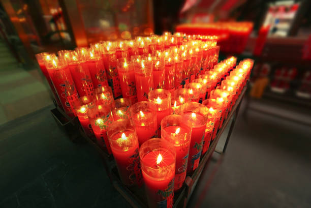 Red Candles and flames in the shrine