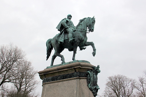 Oslo, Norway - February 24, 2020. Equetrian statue of King Charles XIV John (Karl XIV Johan) in front of the Royal Palace in Oslo, Norway