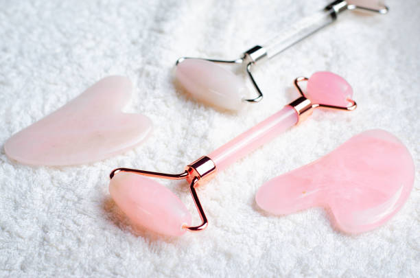 istock Rose Quartz Roller and Gua Sha tool, Facial Lifting Massage Treatment 1496786102